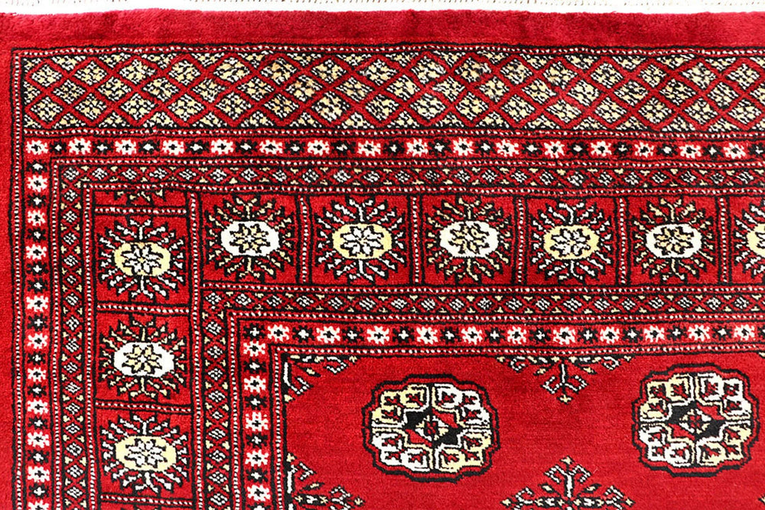 Red Pakistani Bokhara Rug 6' x 9' 10" Hand-Knotted | No. QA28190