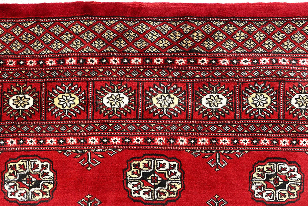 Red Pakistani Bokhara Rug 6' x 9' 10" Hand-Knotted | No. QA28190