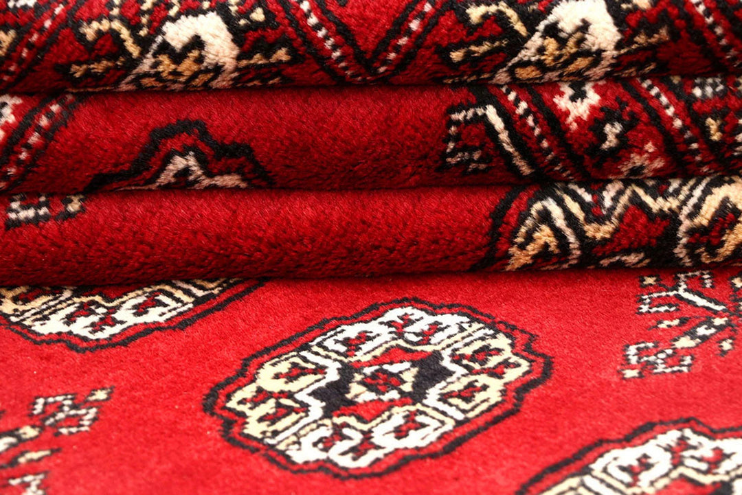 Red Pakistani Bokhara Rug 6' x 9' 10" Hand-Knotted | No. QA28190