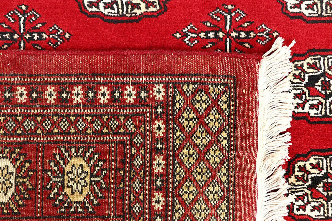 Red Pakistani Bokhara Rug 6' x 9' 10" Hand-Knotted | No. QA28190
