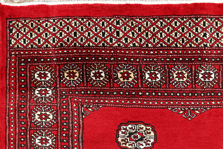Red Pakistani Bokhara Rug 6' x 9'2" Hand-Knotted | No. QA28209