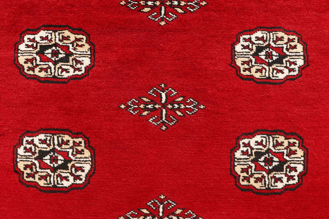 Red Pakistani Bokhara Rug 6' x 9'2" Hand-Knotted | No. QA28209