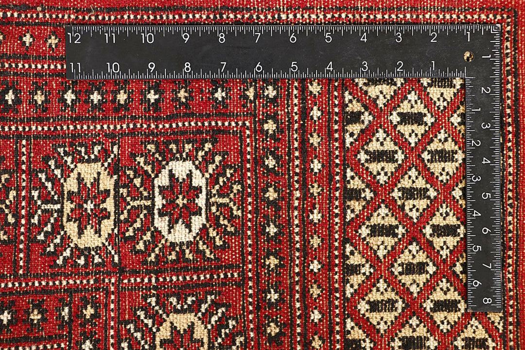 Red Pakistani Bokhara Rug 6' x 9'2" Hand-Knotted | No. QA28209