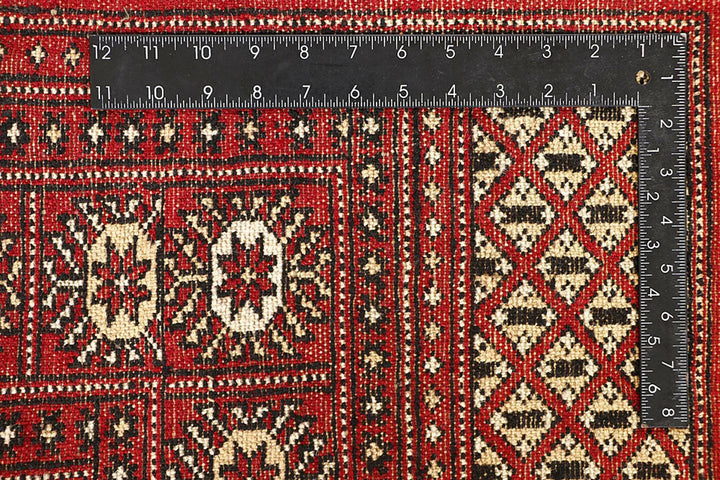 Red Pakistani Bokhara Rug 6' x 9'2" Hand-Knotted | No. QA28209