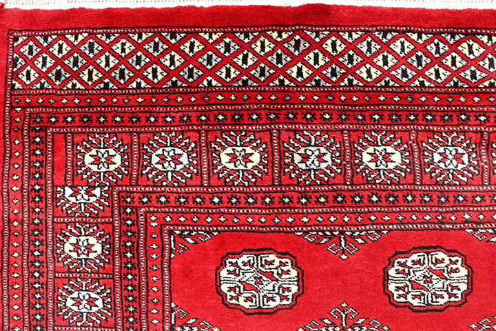 Red Pakistani Bokhara Rug 5' 7" x 8' 11" Hand-Knotted | No. QA28279