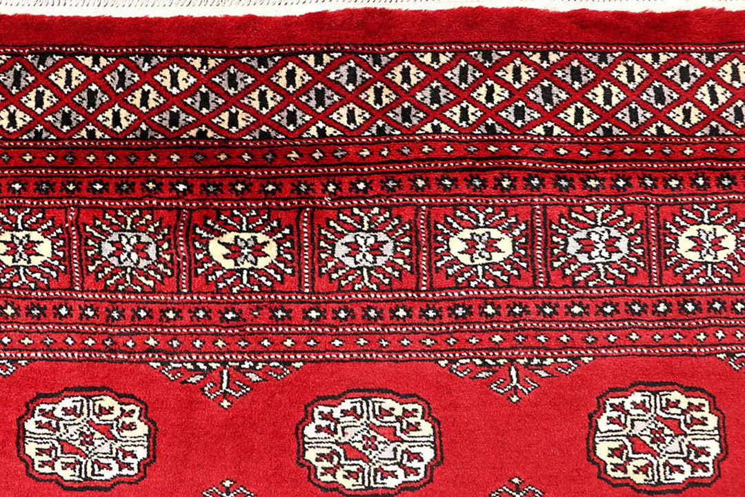 Red Pakistani Bokhara Rug 5' 7" x 8' 11" Hand-Knotted | No. QA28279