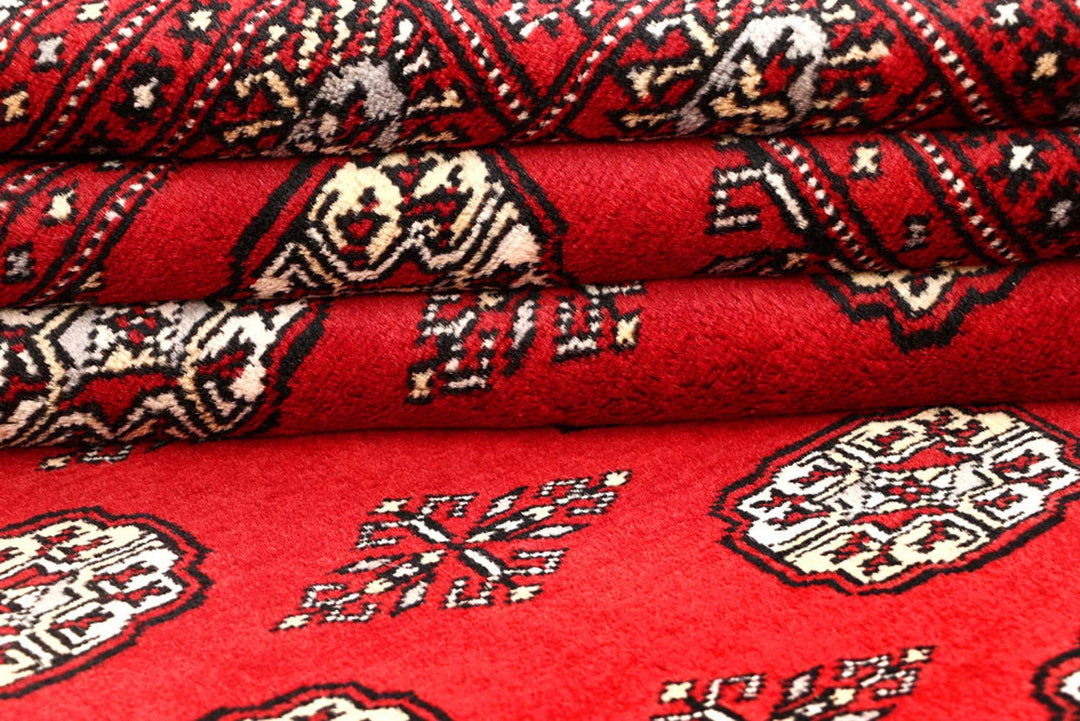 Red Pakistani Bokhara Rug 5' 7" x 8' 11" Hand-Knotted | No. QA28279