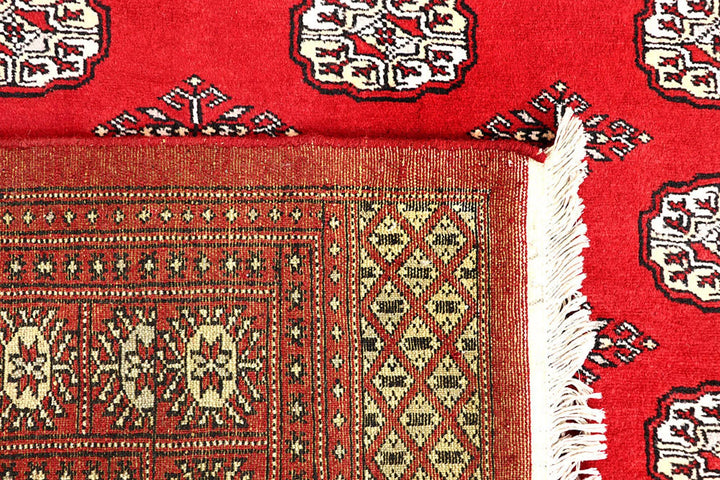 Red Pakistani Bokhara Rug 5' 7" x 8' 11" Hand-Knotted | No. QA28279