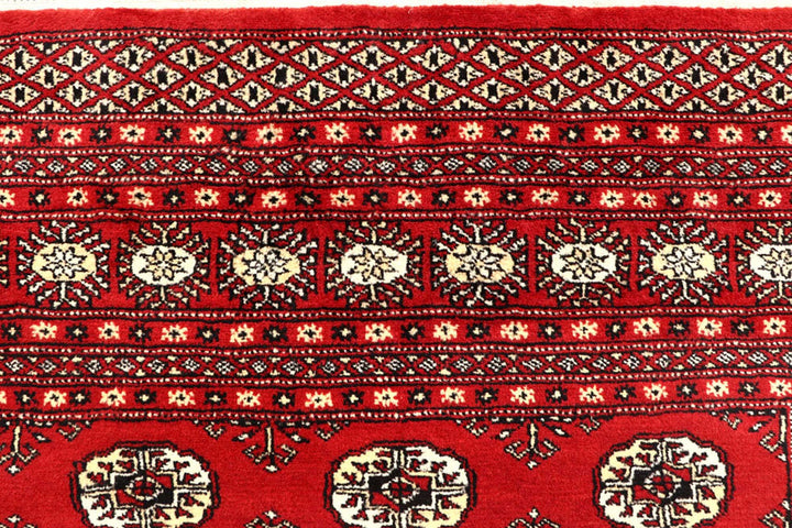 Red Pakistani Bokhara Rug 6' 1" x 9' 4" Hand-Knotted | No. QA28308