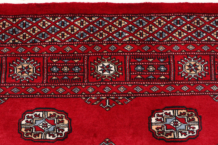 Red Pakistani Bokhara Rug 3' 11" x 6' 3" Hand-Knotted | No. QA28585