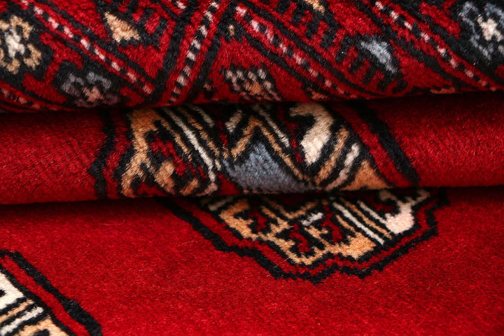 Red Pakistani Bokhara Rug 3' 11" x 6' 3" Hand-Knotted | No. QA28585