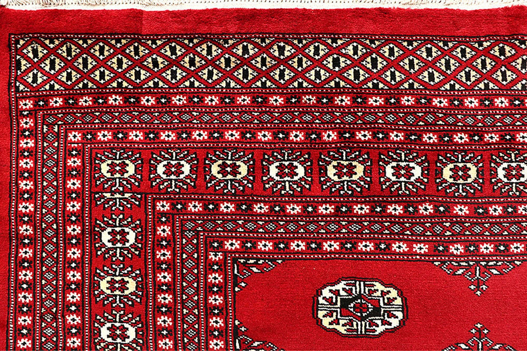 Red Pakistani Bokhara Rug 9' 1" x 12' 2" Hand-Knotted | No. QA29323