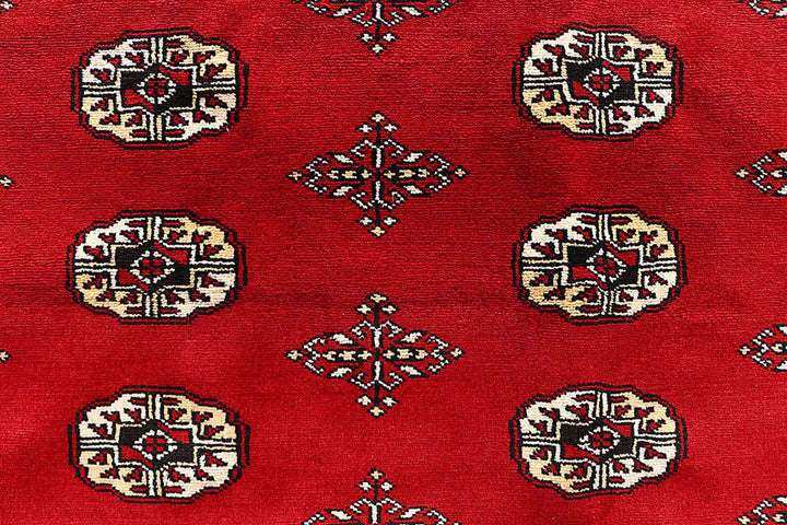 Red Pakistani Bokhara Rug 9' 1" x 12' 2" Hand-Knotted | No. QA29323
