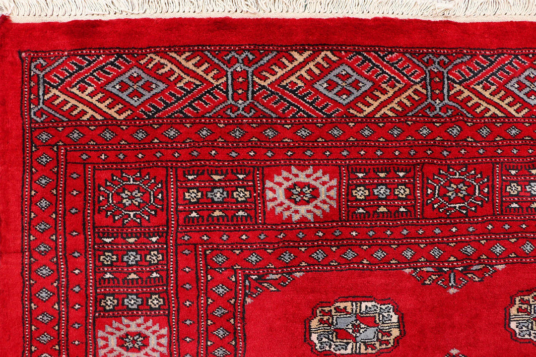 Red Pakistani Bokhara Rug 4' 1" x 6' Hand-Knotted | No. QA29601