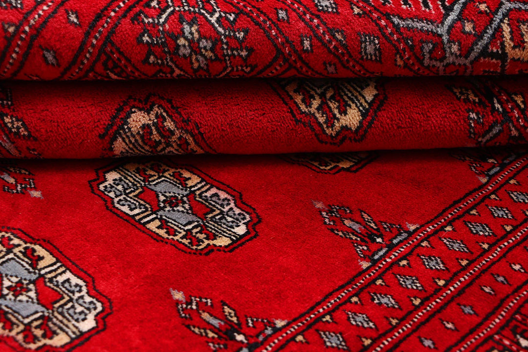 Red Pakistani Bokhara Rug 4' 1" x 6' Hand-Knotted | No. QA29601