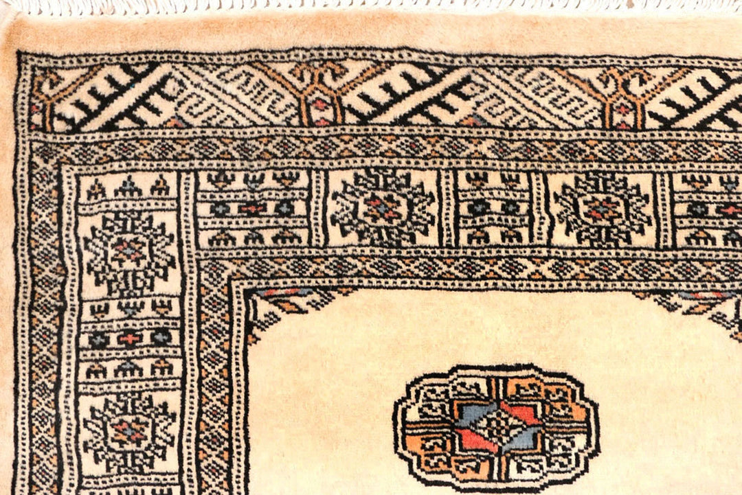 Ivory Pakistani Bokhara Rug 2'7" x 10'2" Hand-Knotted | No. QA29629