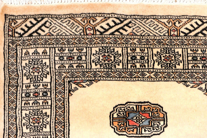 Ivory Pakistani Bokhara Rug 2'7" x 10'2" Hand-Knotted | No. QA29629