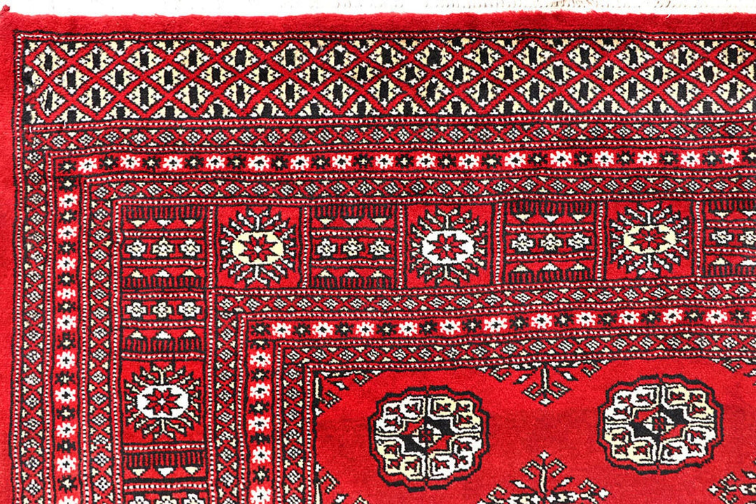 Red Pakistani Bokhara Rug 6' 9" x 8' 10" Hand-Knotted | No. QA29712