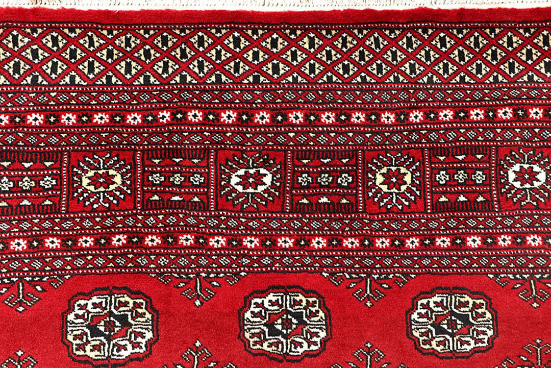 Red Pakistani Bokhara Rug 6' 9" x 8' 10" Hand-Knotted | No. QA29712