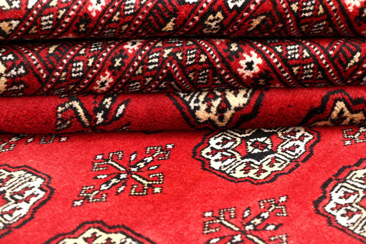 Red Pakistani Bokhara Rug 6' 9" x 8' 10" Hand-Knotted | No. QA29712