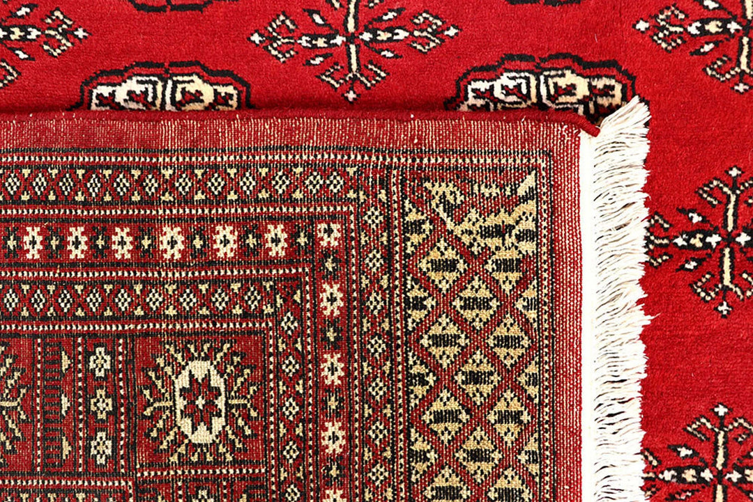 Red Pakistani Bokhara Rug 6' 9" x 8' 10" Hand-Knotted | No. QA29712