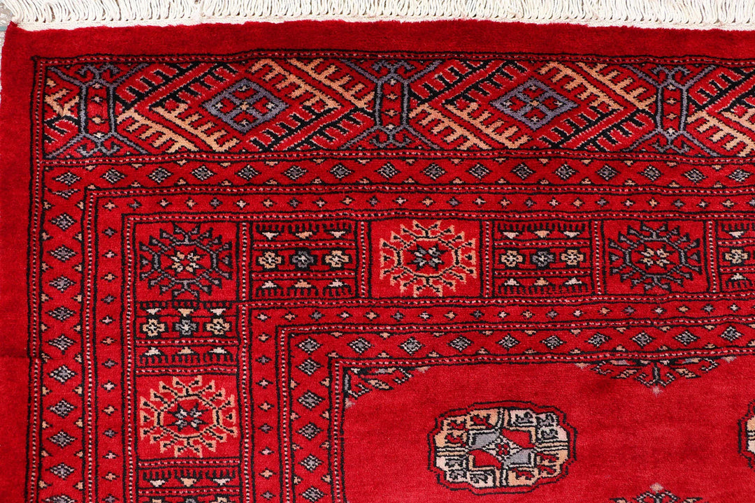 Red Pakistani Bokhara Rug 4' 2" x 6' 4" Hand-Knotted | No. QA29806