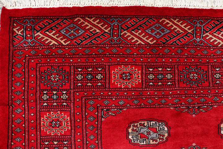 Red Pakistani Bokhara Rug 4' 2" x 6' 4" Hand-Knotted | No. QA29806