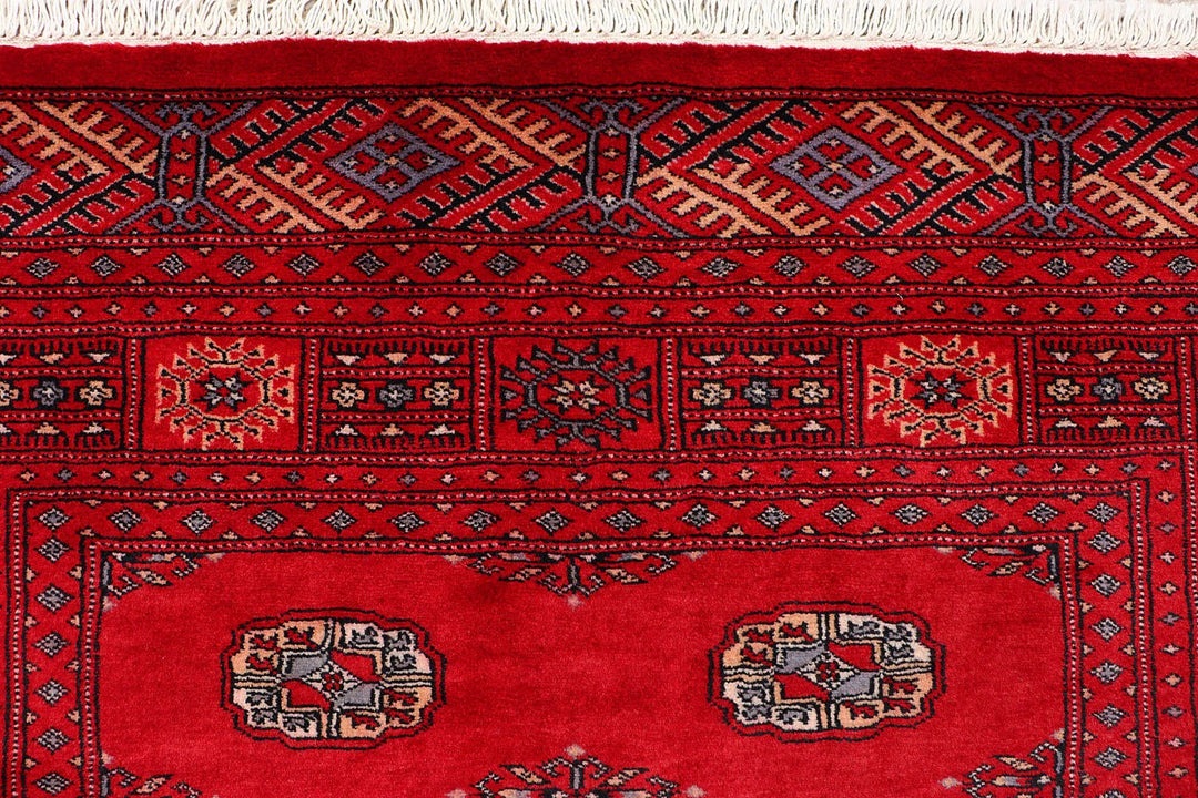 Red Pakistani Bokhara Rug 4' 2" x 6' 4" Hand-Knotted | No. QA29806