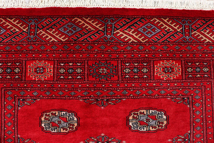 Red Pakistani Bokhara Rug 4' 2" x 6' 4" Hand-Knotted | No. QA29806