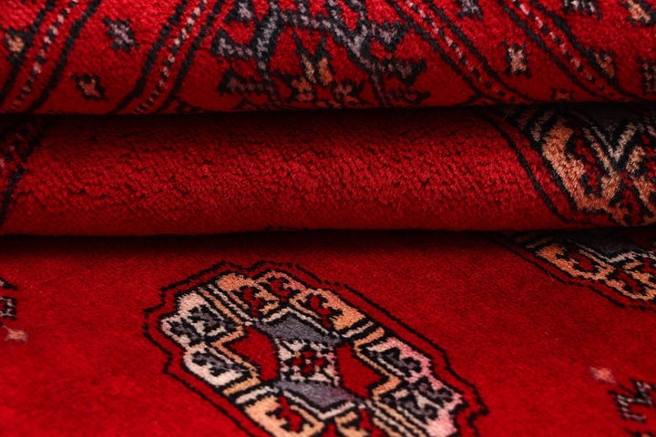 Red Pakistani Bokhara Rug 4' 2" x 6' 4" Hand-Knotted | No. QA29806