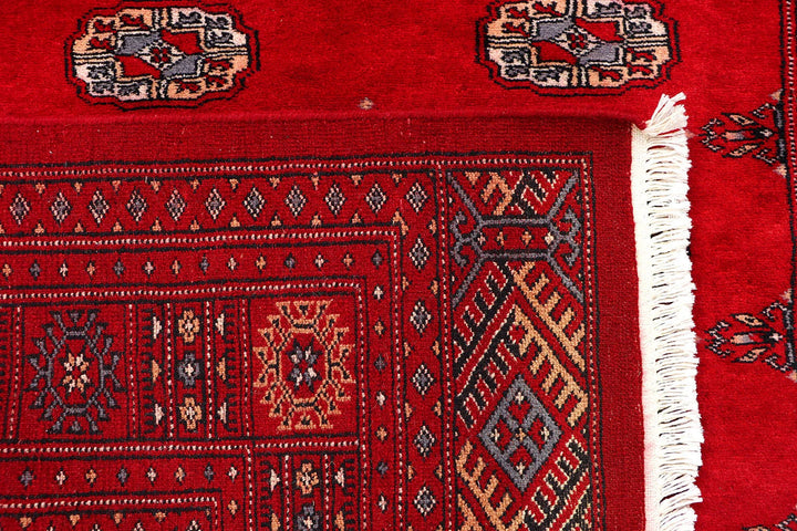 Red Pakistani Bokhara Rug 4' 2" x 6' 4" Hand-Knotted | No. QA29806