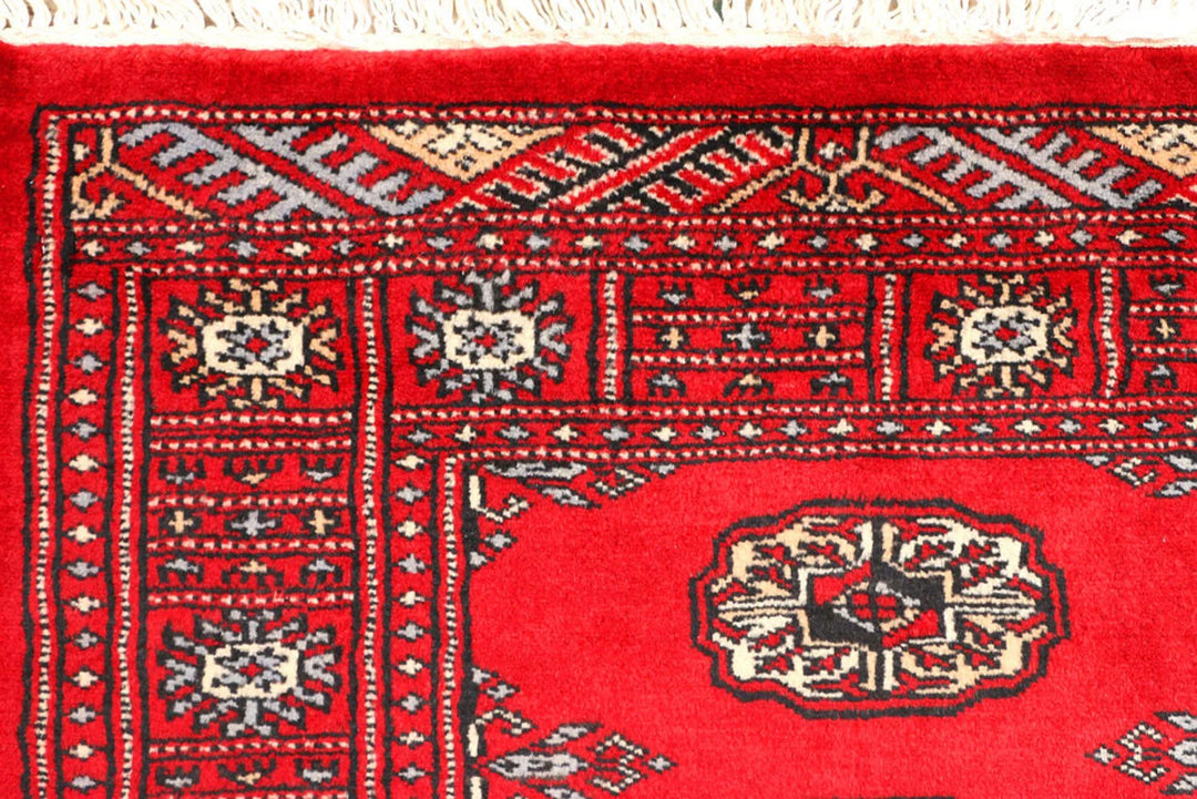 Red Pakistani Bokhara Rug 2' 7" x 6' 2" Hand-Knotted | No. QA29834