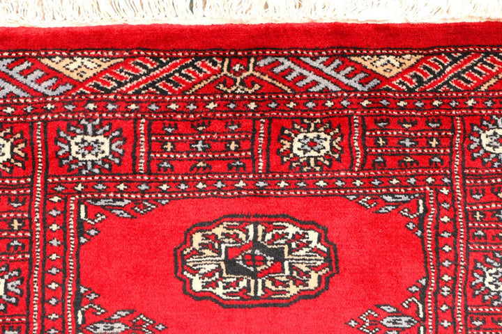 Red Pakistani Bokhara Rug 2' 7" x 6' 2" Hand-Knotted | No. QA29834