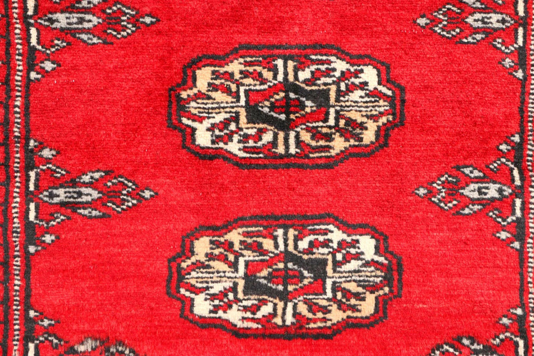 Red Pakistani Bokhara Rug 2' 7" x 6' 2" Hand-Knotted | No. QA29834