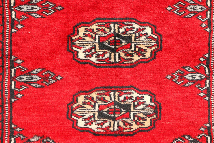 Red Pakistani Bokhara Rug 2' 7" x 6' 2" Hand-Knotted | No. QA29834