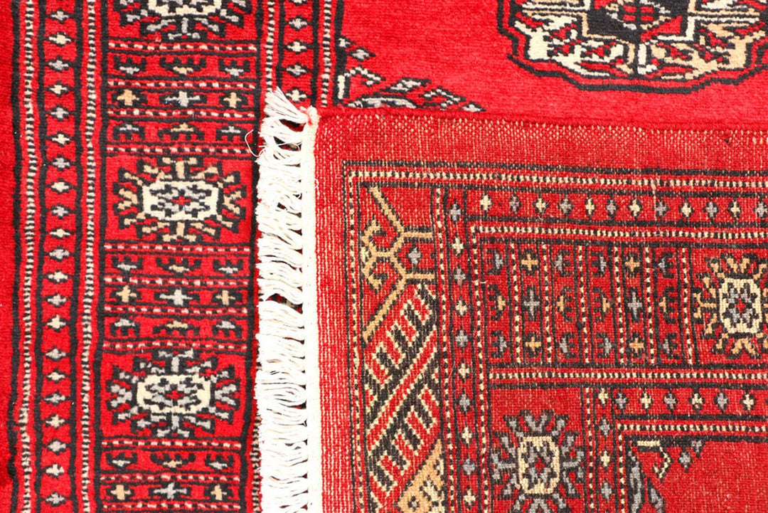 Red Pakistani Bokhara Rug 2' 7" x 6' 2" Hand-Knotted | No. QA29834