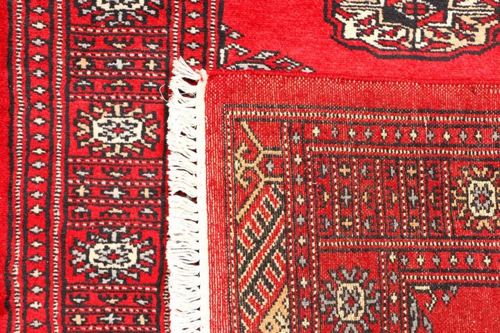 Red Pakistani Bokhara Rug 2' 7" x 6' 2" Hand-Knotted | No. QA29834