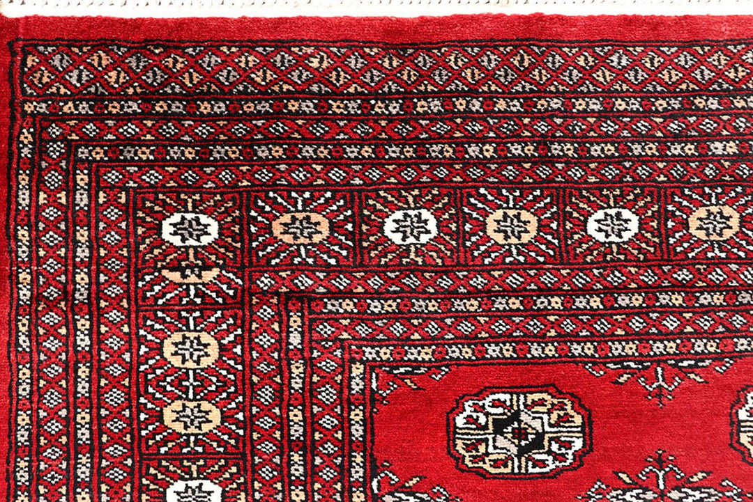 Red Pakistani Bokhara Rug 6' x 9' 3" Hand-Knotted | No. QA29837