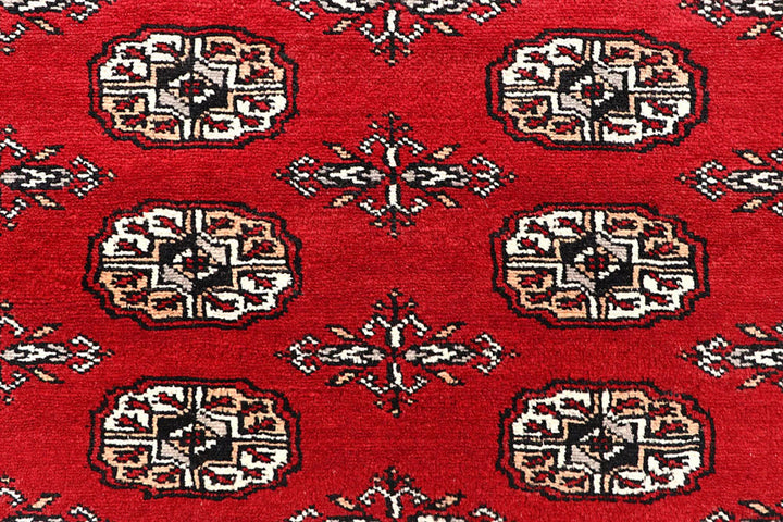 Red Pakistani Bokhara Rug 6' x 9' 3" Hand-Knotted | No. QA29837