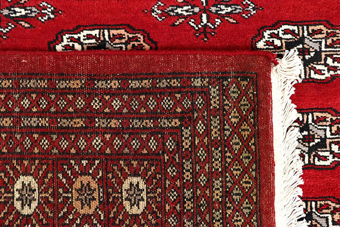 Red Pakistani Bokhara Rug 6' x 9' 3" Hand-Knotted | No. QA29837