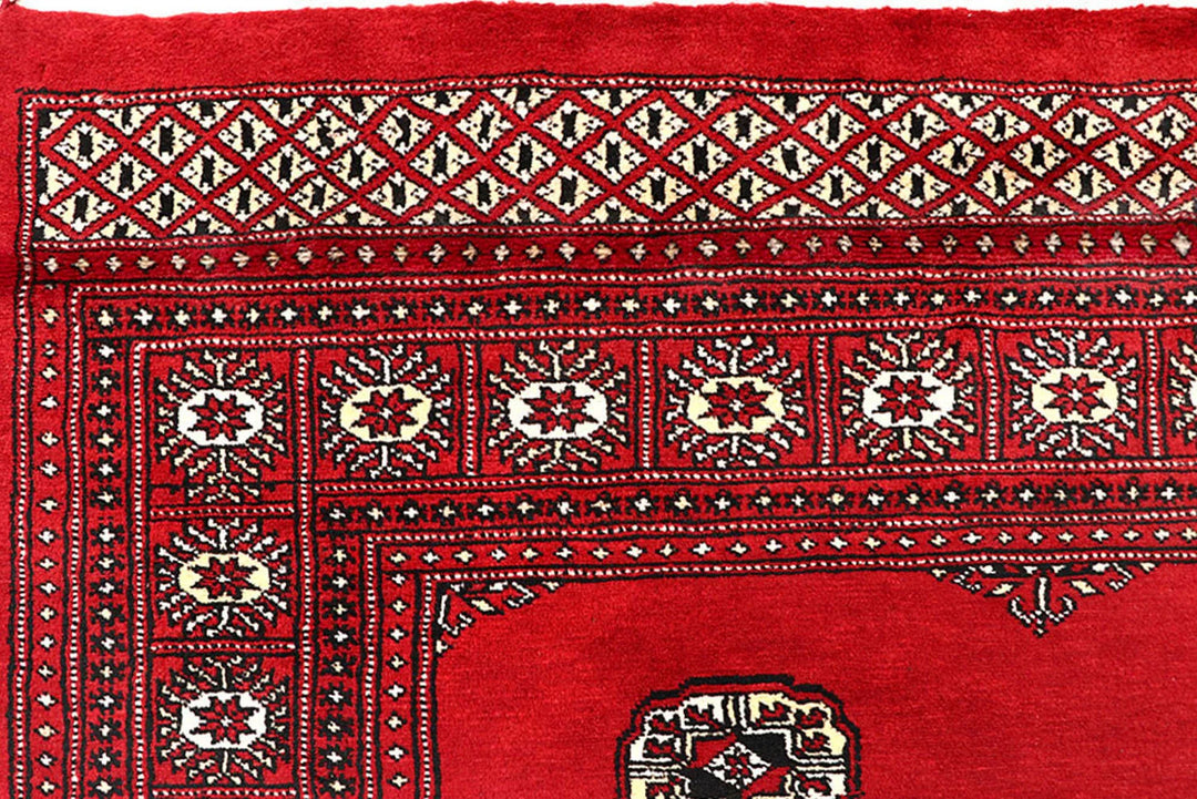 Red Pakistani Bokhara Rug 6' 4" x 9' 3" Hand-Knotted | No. QA30849