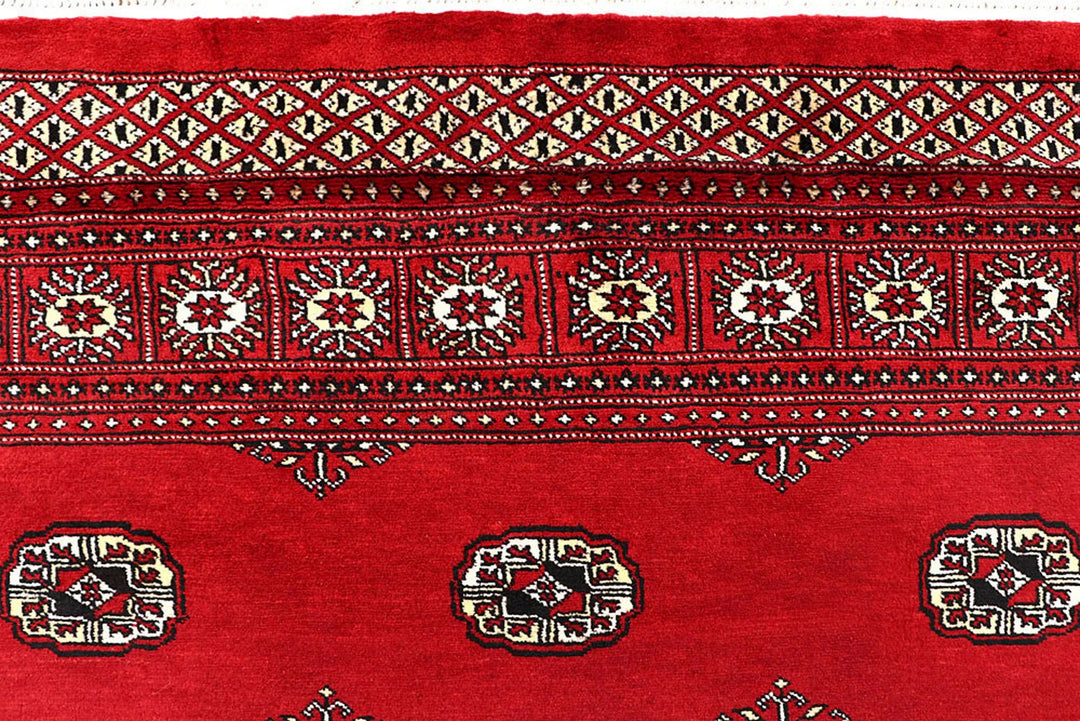 Red Pakistani Bokhara Rug 6' 4" x 9' 3" Hand-Knotted | No. QA30849