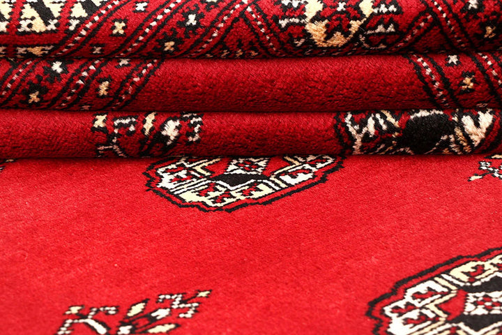 Red Pakistani Bokhara Rug 6' 4" x 9' 3" Hand-Knotted | No. QA30849