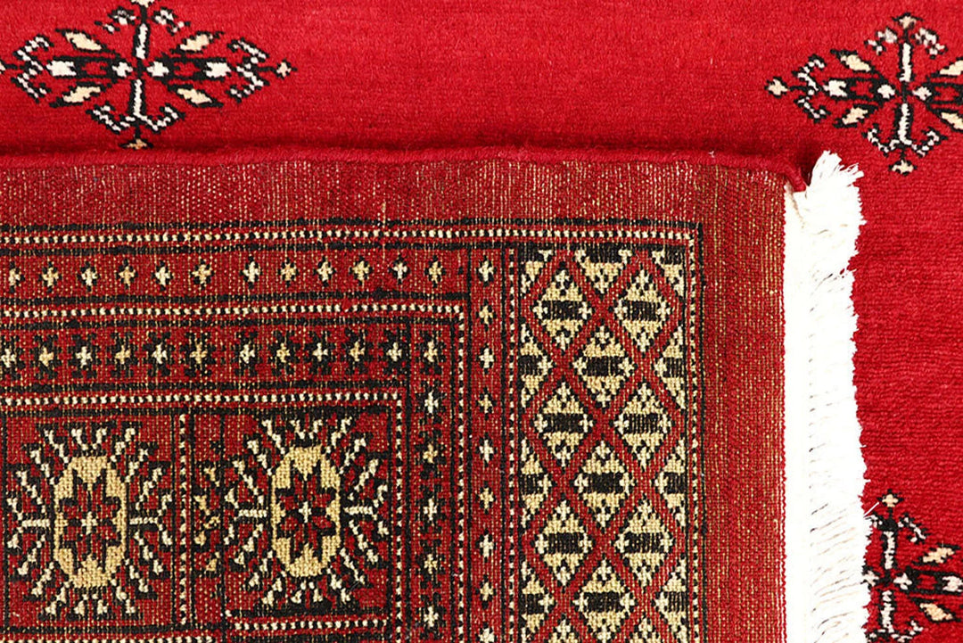 Red Pakistani Bokhara Rug 6' 4" x 9' 3" Hand-Knotted | No. QA30849