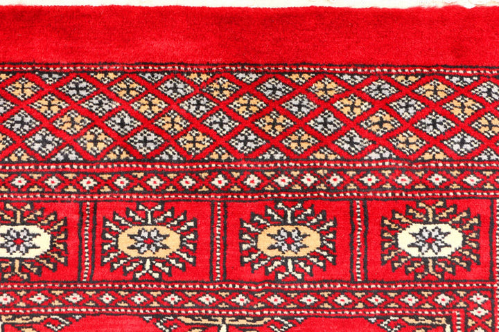 Red Pakistani Bokhara Rug 2' 11" x 4' 9" Hand-Knotted | No. QA31070
