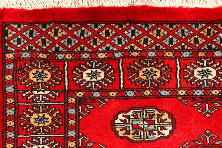 Red Pakistani Bokhara Rug 3' 1" x 5' 1" Hand-Knotted | No. QA31606
