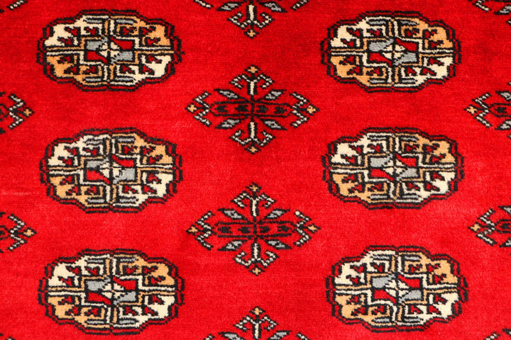 Red Pakistani Bokhara Rug 3' 1" x 5' 1" Hand-Knotted | No. QA31606
