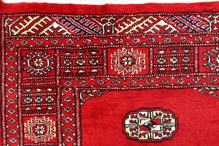 Red Pakistani Bokhara Rug 4' 2" x 6' 1" Hand-Knotted | No. QA32084