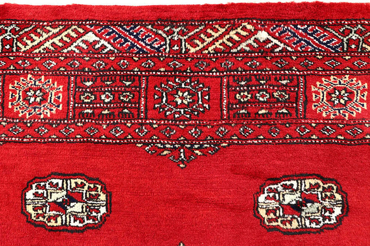 Red Pakistani Bokhara Rug 4' 2" x 6' 1" Hand-Knotted | No. QA32084