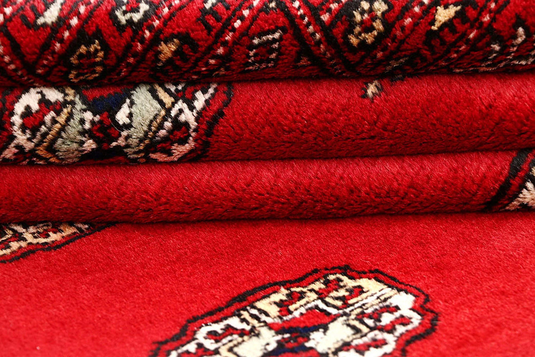 Red Pakistani Bokhara Rug 4' 2" x 6' 1" Hand-Knotted | No. QA32084